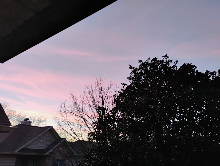 A photo of a western sky showing sunset colors.